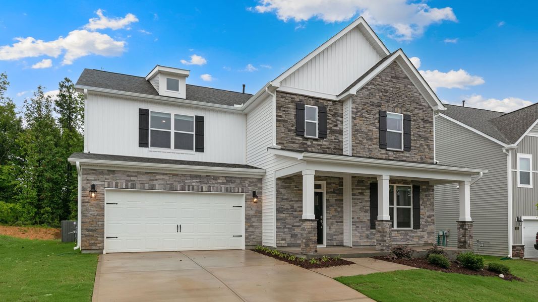 Representative exterior photo of a completed home built from the Jordan by D.R. Horton in Kalas Falls, Wake Forest, NC (Image 30). Representative exterior photo of a completed home built from the Jordan by D.R. Horton in Kalas Falls, Wake Forest, NC (Image 30).