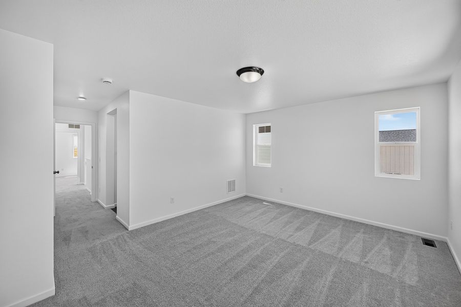 Spacious, unfurnished interior of a new home in Sky Ranch, Watkins (Image 17). Spacious, unfurnished interior of a new home in Sky Ranch, Watkins (Image 17).
