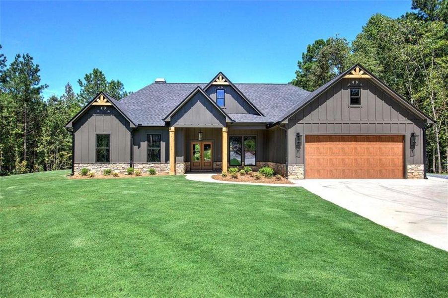 Front exterior of a new home in , Temple, GA, highlighting curb appeal (Image 2).