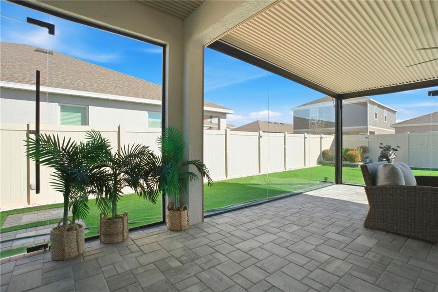 Exterior details and patio area of a home in Storey Creek, Kissimmee (Image 4).