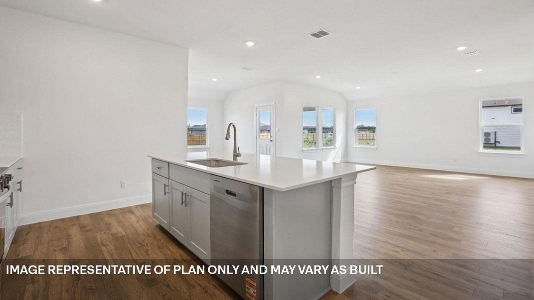 Representative furnished interior of a home built from the The Grayson by D.R. Horton in Railhead, Cedar Creek (Image 4).