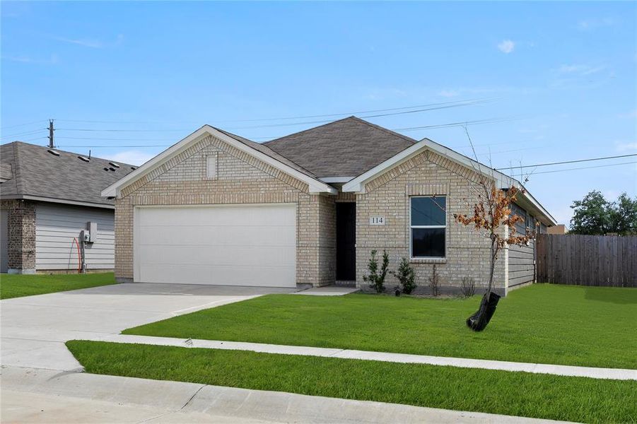 Front exterior of a new home in Labein Villas, Greenville, TX, highlighting curb appeal (Image 2). Front exterior of a new home in Labein Villas, Greenville, TX, highlighting curb appeal (Image 2).
