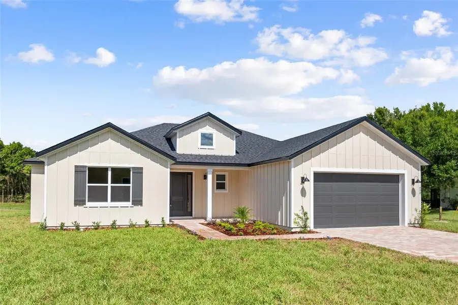 Front exterior of a new home in , St. Cloud, FL, highlighting curb appeal (Image 1). Front exterior of a new home in , St. Cloud, FL, highlighting curb appeal (Image 1).