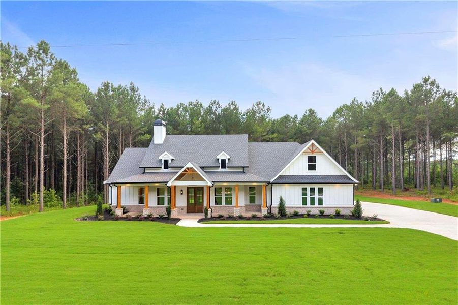 Front exterior of a new home in , Monroe, GA, highlighting curb appeal (Image 30).