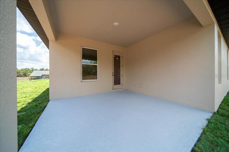 Exterior details and patio area of a home in , Spring Hill (Image 33).
