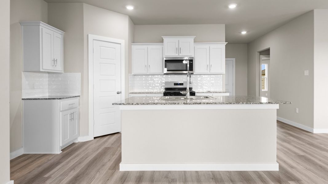 Representative furnished interior of a home built from the BANDERA by D.R. Horton in Heritage Parks, Abilene (Image 6).