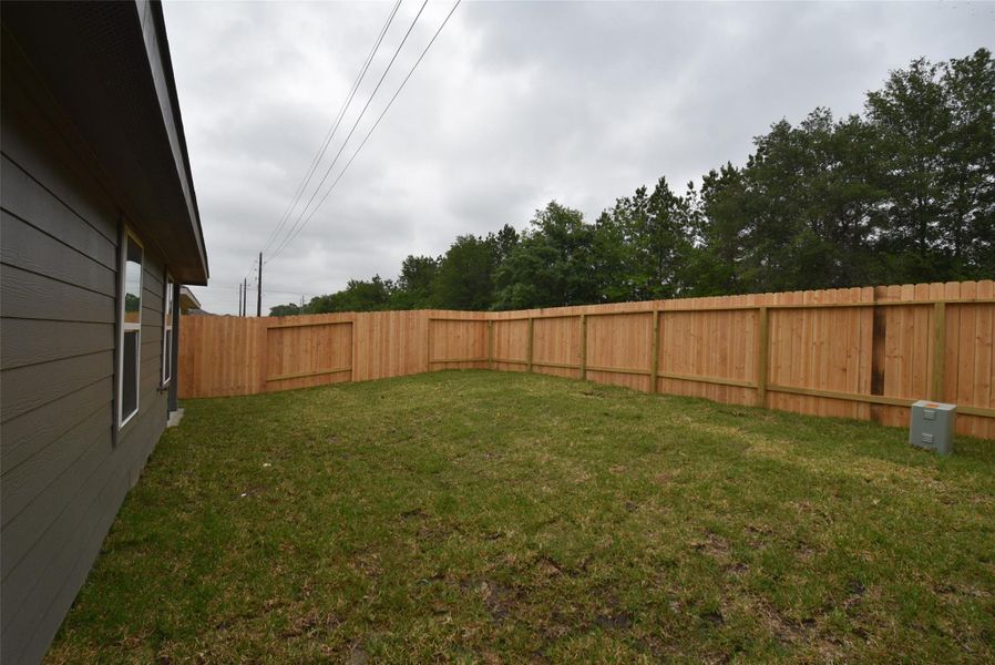 Exterior details and patio area of a home in , Houston (Image 28). Exterior details and patio area of a home in , Houston (Image 28).