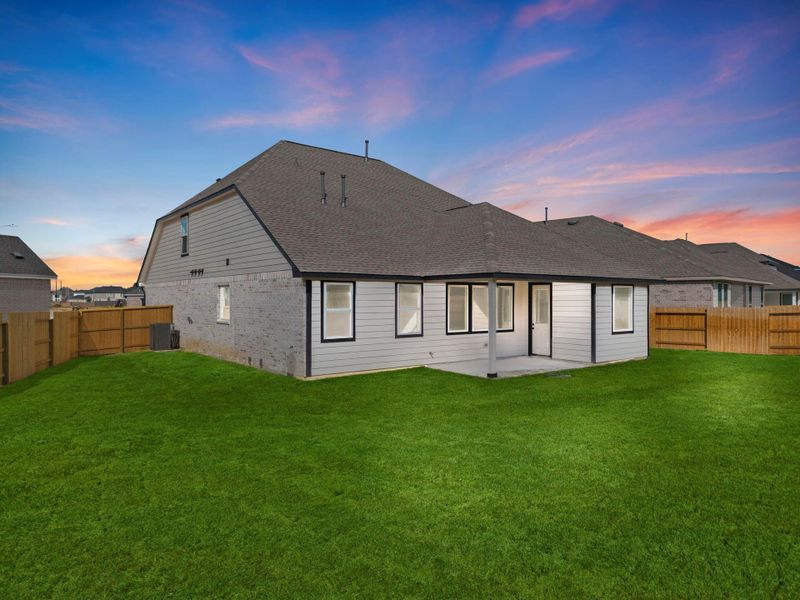 This backyard is perfect for family gatherings, social events, or simply unwinding in the fresh air. This backyard is perfect for family gatherings, social events, or simply unwinding in the fresh air.