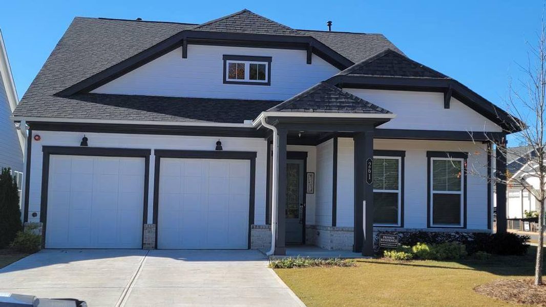 Front exterior of a new home in The Reserve at Bells Ferry, Kennesaw, GA, highlighting curb appeal (Image 2).