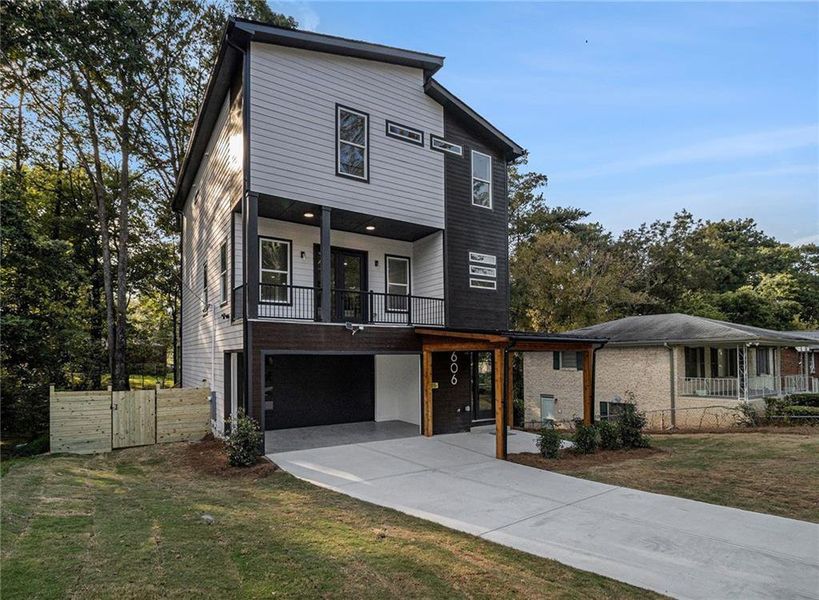 Front exterior of a new home in , Atlanta, GA, highlighting curb appeal (Image 1).