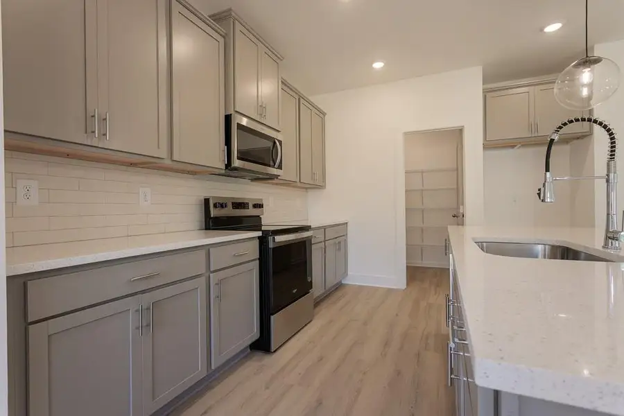 Furnished interior view inside a new home in , Buford (Image 8).