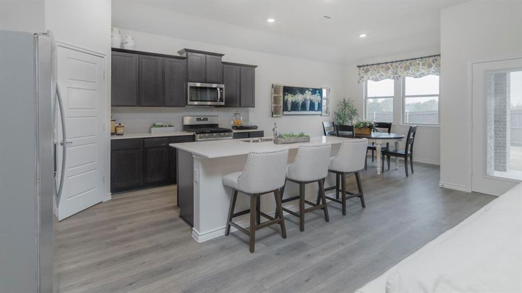 Furnished interior view inside a new home in Prairie Oaks, Oak Point (Image 5). Furnished interior view inside a new home in Prairie Oaks, Oak Point (Image 5).