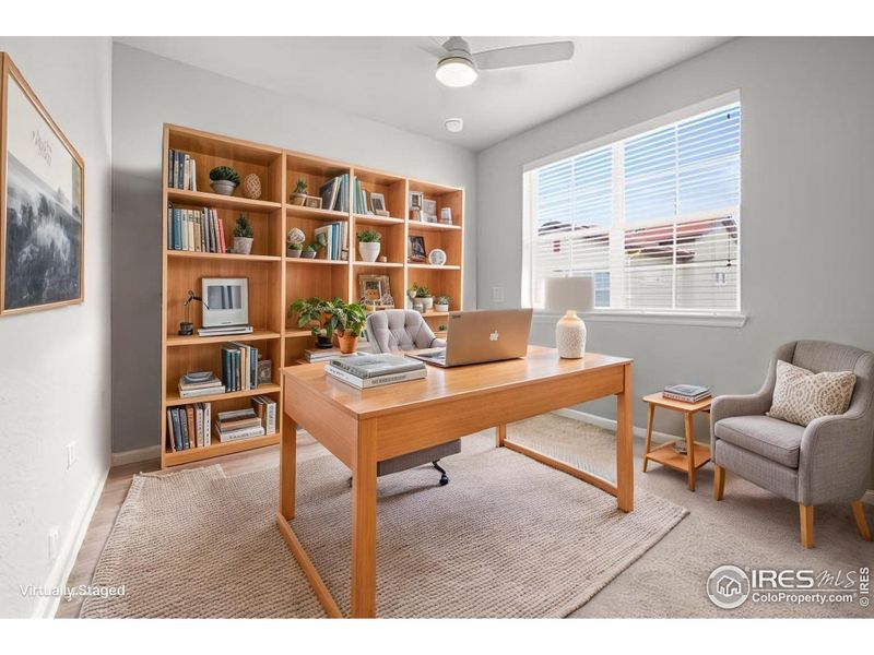 Second bedroom - Digitally Staged as an Office. Second bedroom - Digitally Staged as an Office.