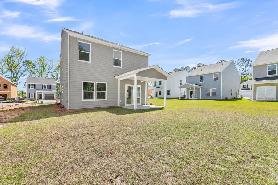 Exterior details and patio area of a home in Central Creek, Goose Creek (Image 20).
