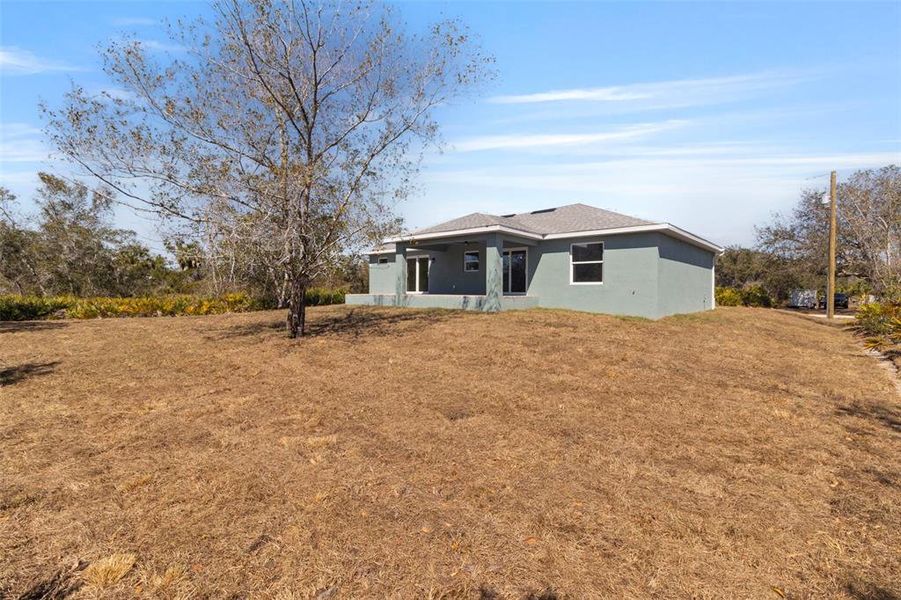 Exterior details and patio area of a home in , Port Charlotte (Image 20).