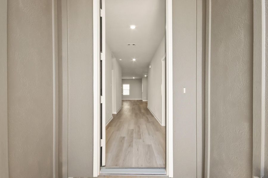 Front exterior of a new home in Westridge Cove 40', Conroe, TX, highlighting curb appeal (Image 15).