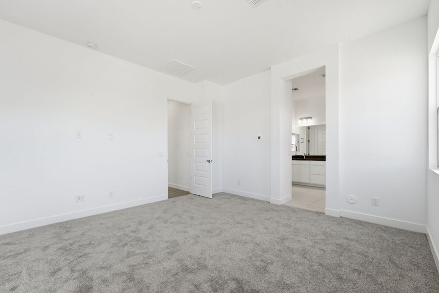 Spacious, unfurnished interior of a new home in Combs Ranch, San Tan Valley (Image 26).