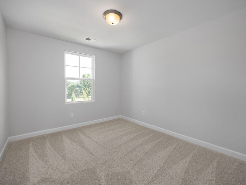 Spacious, unfurnished interior of a new home in Springvale, Fuquay Varina (Image 19).