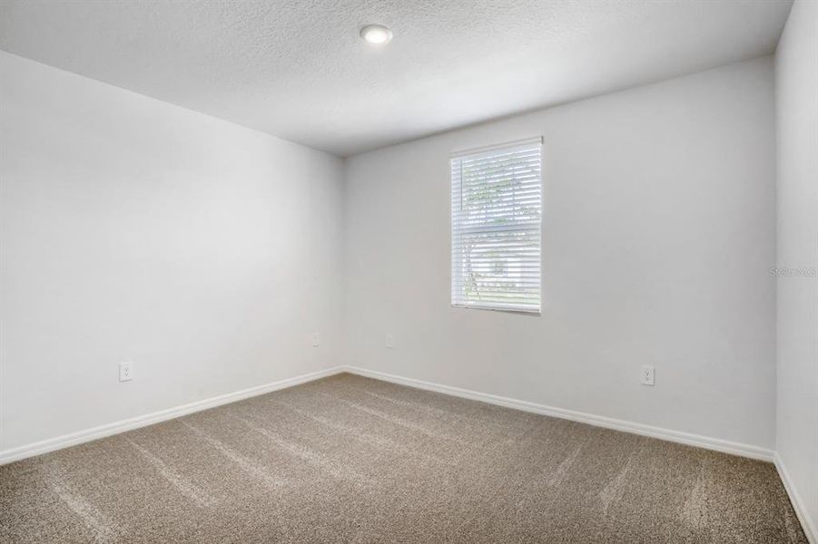 Spacious, unfurnished interior of a new home in Salt Meadows - Classic Series, Parrish (Image 22).