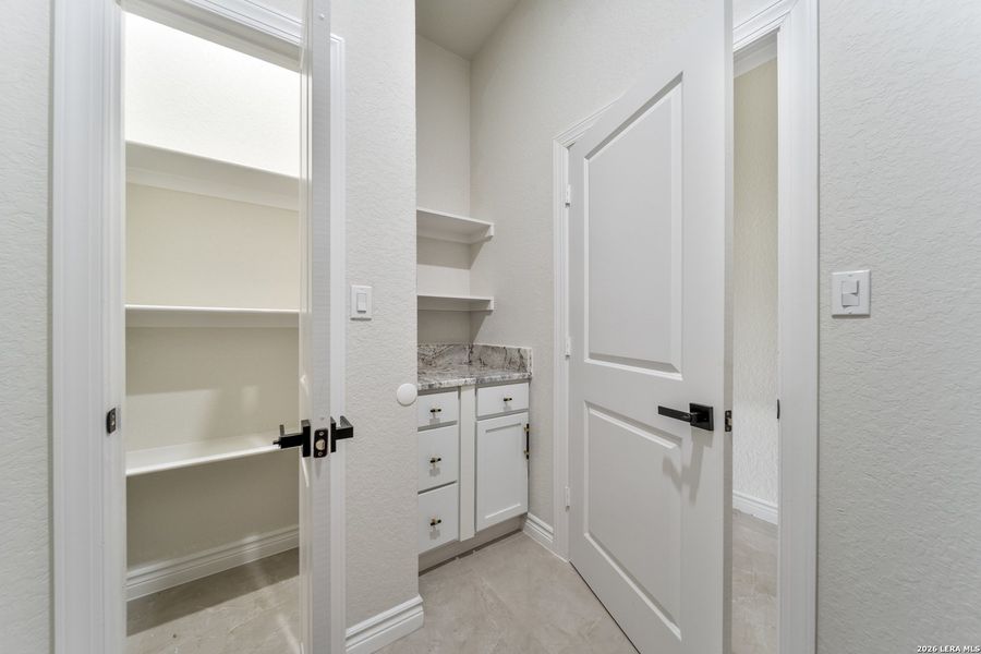 Furnished interior view inside a new home in , Atascosa (Image 15).