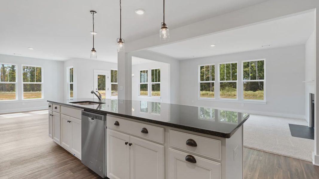 Representative furnished interior of a home built from the Stonefield - Finished Basement by DRB Homes in Pinebrook, Woodruff (Image 6).