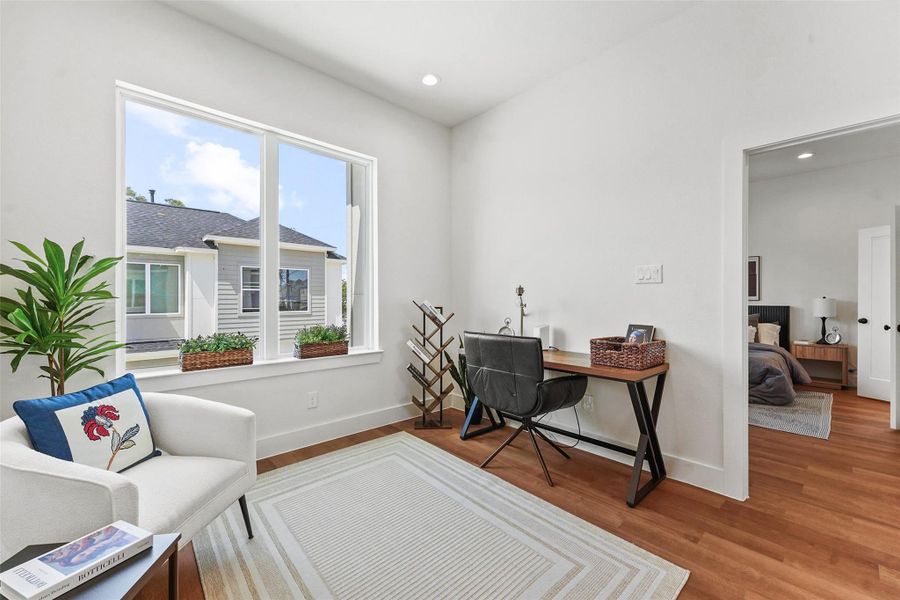 Bright and airy flex space with large Low-E windows, wood flooring, and a versatile layout—perfect for a home office or reading nook. Bright and airy flex space with large Low-E windows, wood flooring, and a versatile layout—perfect for a home office or reading nook.