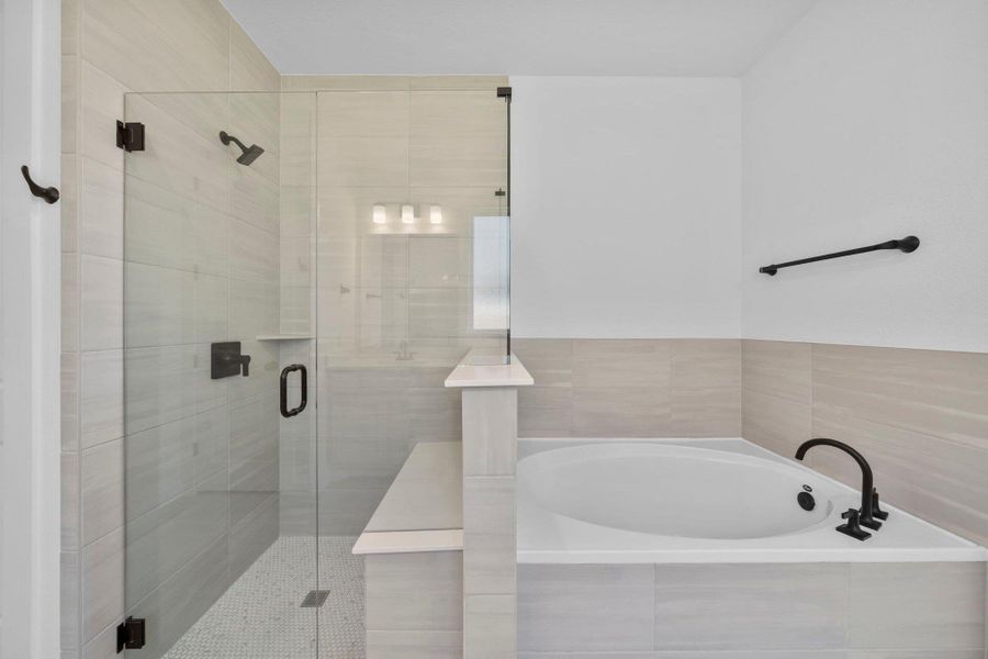 Primary Bath retreat with garden tub & walk-in shower Primary Bath retreat with garden tub & walk-in shower