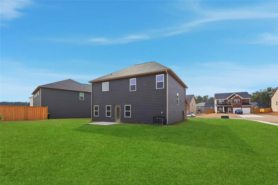 Exterior details and patio area of a home in Fern Dale, Fairburn (Image 21).