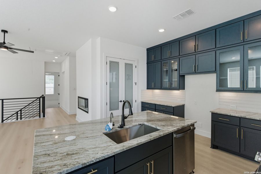 Furnished interior view inside a new home in Centero at Stone Oak, San Antonio (Image 8).