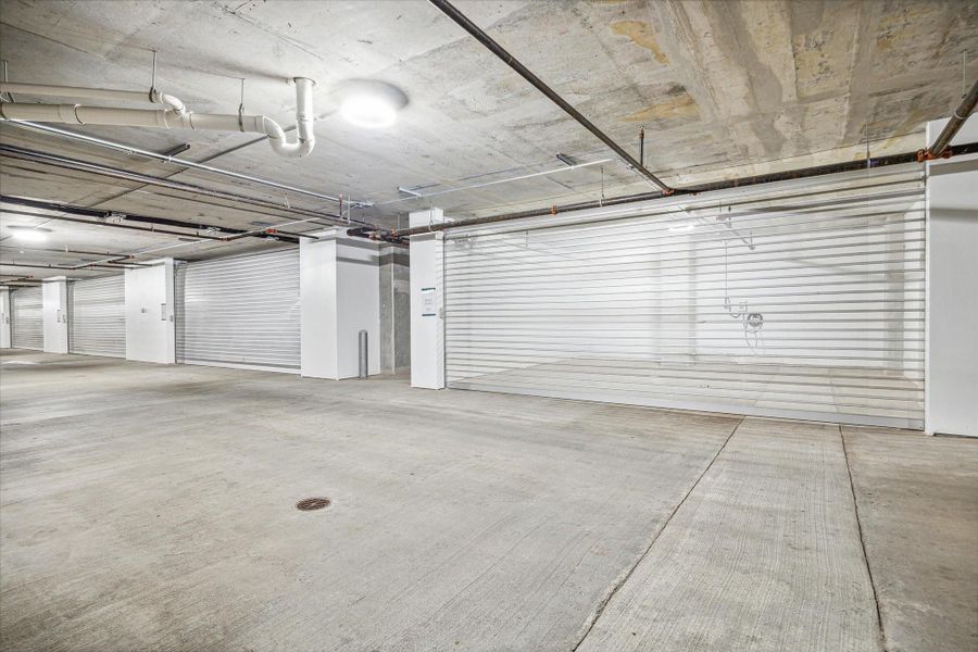 This unit includes a private 3-car garage in addition to the standard 2 assigned parking spaces.
