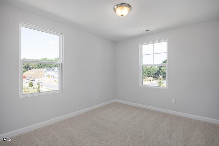 Spacious, unfurnished interior of a new home in Springvale, Fuquay Varina (Image 25).