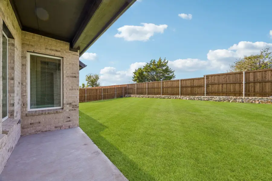 Exterior details and patio area of a home in Rainwater Crossing, Celina (Image 3).