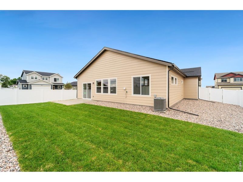 Exterior details and patio area of a home in Union Colony West, Greeley (Image 3).
