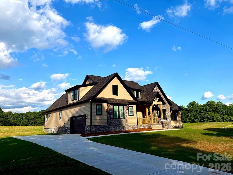 Front exterior of a new home in , Statesville, NC, highlighting curb appeal (Image 4).