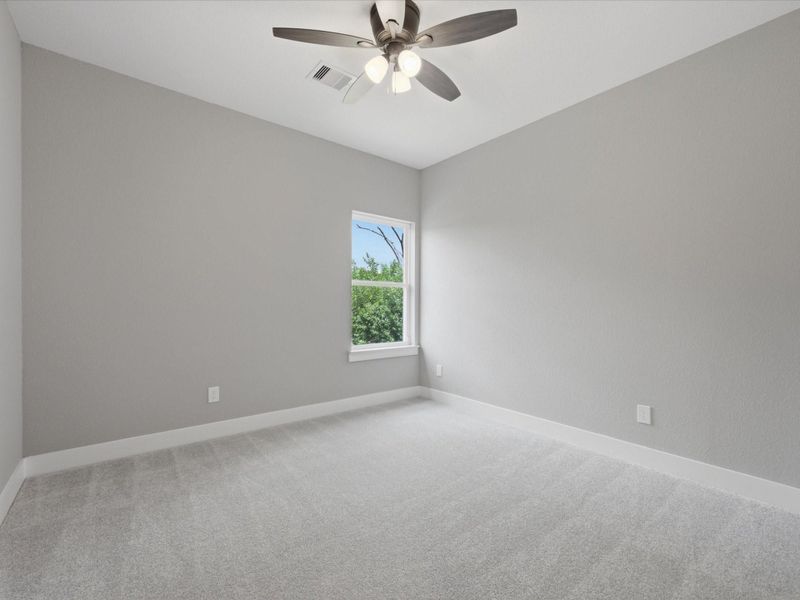 Whether used as a guest room, home office, or creative space, this secondary bedroom offers exceptional flexibility. Whether used as a guest room, home office, or creative space, this secondary bedroom offers exceptional flexibility.