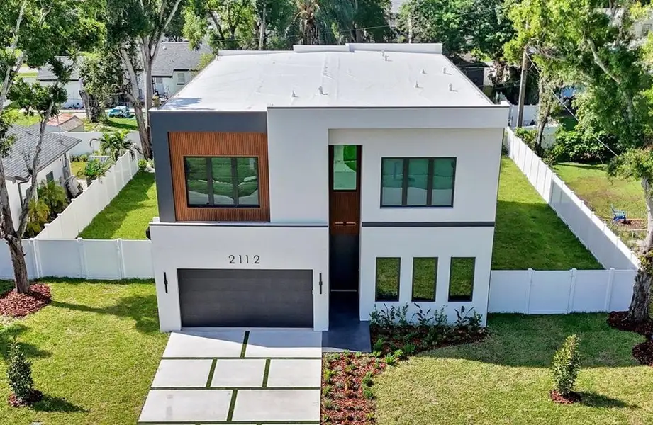 Front exterior of a new home in , Tampa, FL, highlighting curb appeal (Image 28).