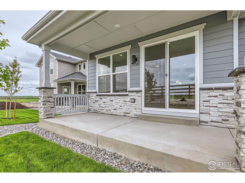 Exterior details and patio area of a home in Barefoot Lakes, Longmont (Image 3).