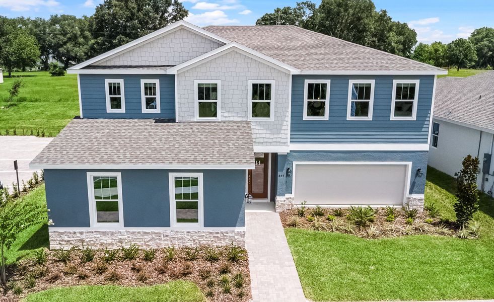 Representative exterior photo of a completed home built from the Paxton by Hartizen Homes in Eden Crest, Apopka, FL (Image 23).