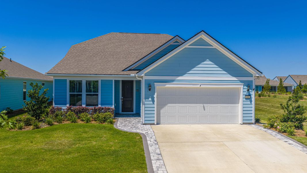 Front exterior of a new home in , Summerville, SC, highlighting curb appeal (Image 1). Front exterior of a new home in , Summerville, SC, highlighting curb appeal (Image 1).
