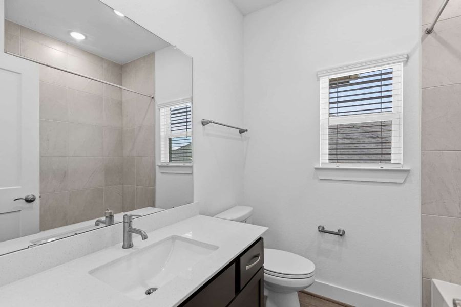 Furnished interior view inside a new home in Parkside on the River, Georgetown (Image 12).