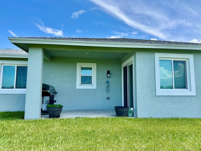 Front exterior of a new home in , Okeechobee, FL, highlighting curb appeal (Image 22).