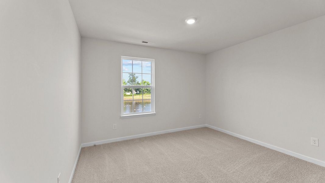 Spacious, unfurnished interior of a new home in Ridgewood Farms, Winterville (Image 18).