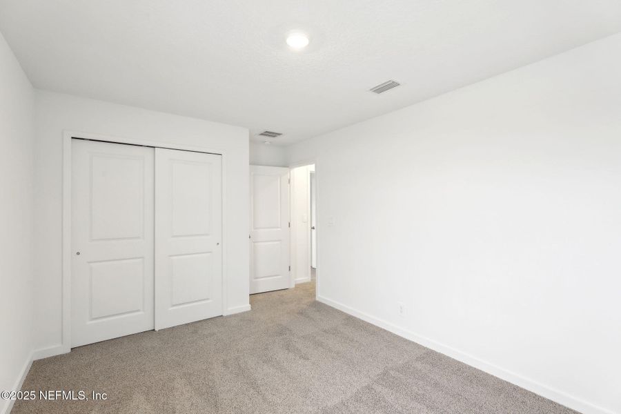 Spacious, unfurnished interior of a new home in Lakes at Bella Lago - Signature Series, Green Cove Springs (Image 24). Spacious, unfurnished interior of a new home in Lakes at Bella Lago - Signature Series, Green Cove Springs (Image 24).