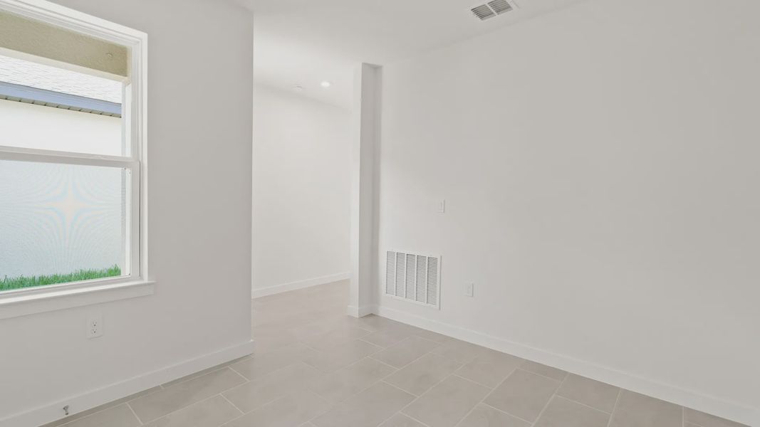 Furnished interior view inside a new home in Grasslands West, Lakeland (Image 22).