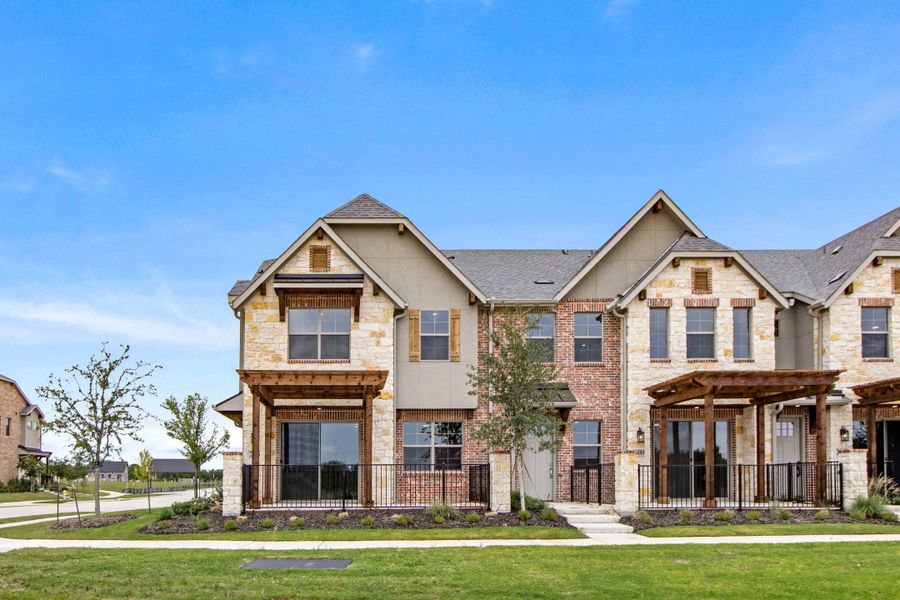 Front exterior of a new home in The Tribute, The Colony, TX, highlighting curb appeal (Image 2). Front exterior of a new home in The Tribute, The Colony, TX, highlighting curb appeal (Image 2).