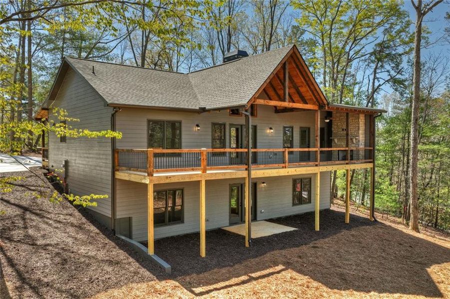 Exterior details and patio area of a home in , Ellijay (Image 29).