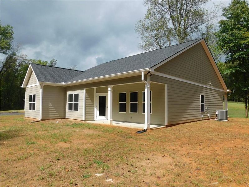 Exterior details and patio area of a home in , Dahlonega (Image 1).