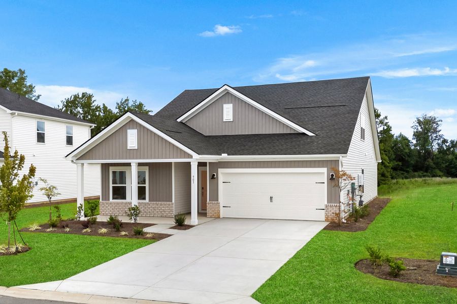 Front exterior of a new home in Cypress Ridge - The Coastline Series, Longs, SC, highlighting curb appeal (Image 1).