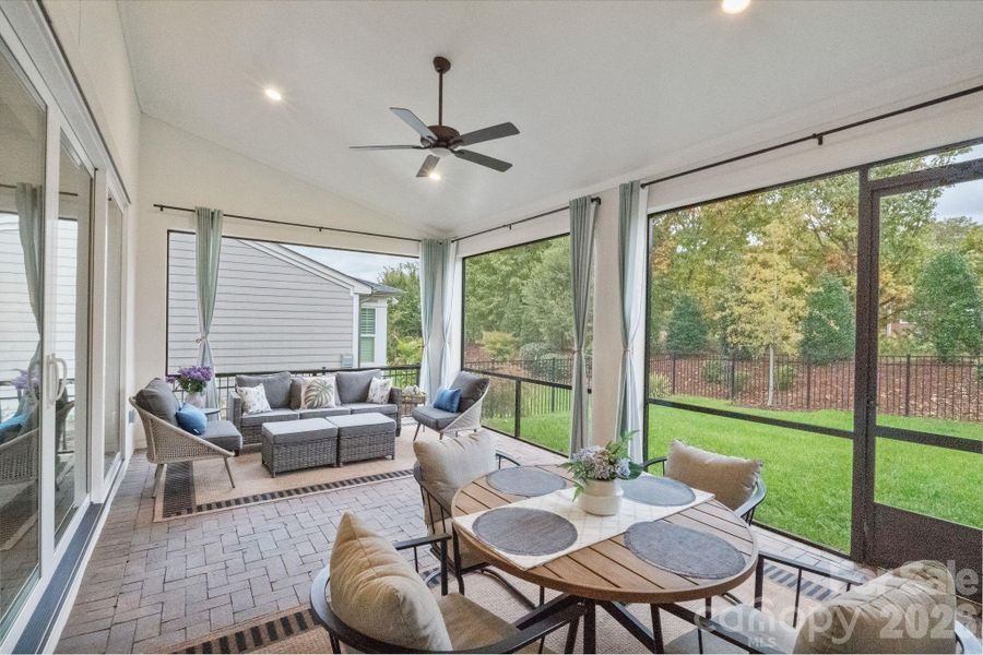 Upgraded screened in patio is perfect for entertaining!