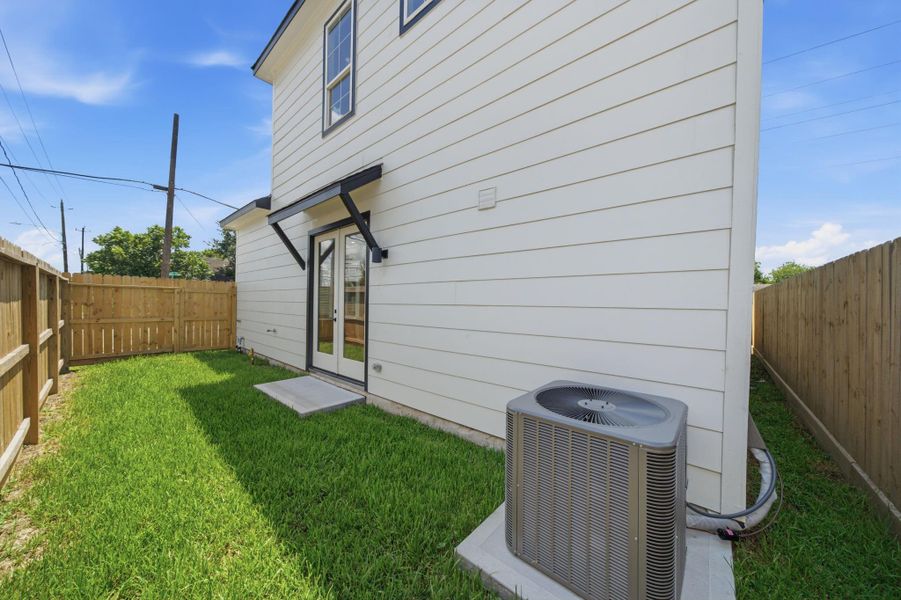 Exterior details and patio area of a home in , Houston (Image 18). Exterior details and patio area of a home in , Houston (Image 18).